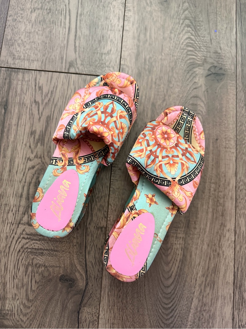 Woman’s pink print platforms